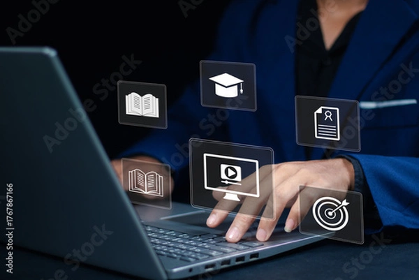 Fototapeta E-learning and digital education concept. Businessman using online learning platforms with icons of books, graduation cap, video course and certificate. Virtual learning and modern teaching tools.