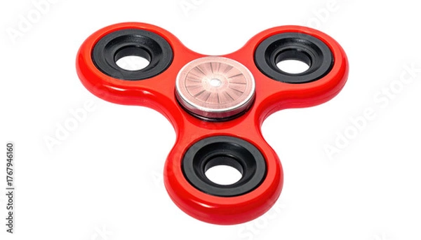 Fototapeta A red fidget spinner toy with three black circles and a transparent center on a black background