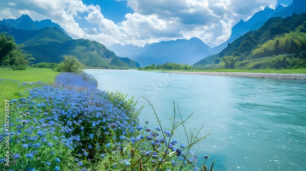Obraz River flowing through mountainous landscape