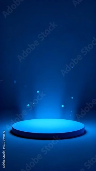 Fototapeta A circular platform illuminated by blue light in a dark space with glowing particles