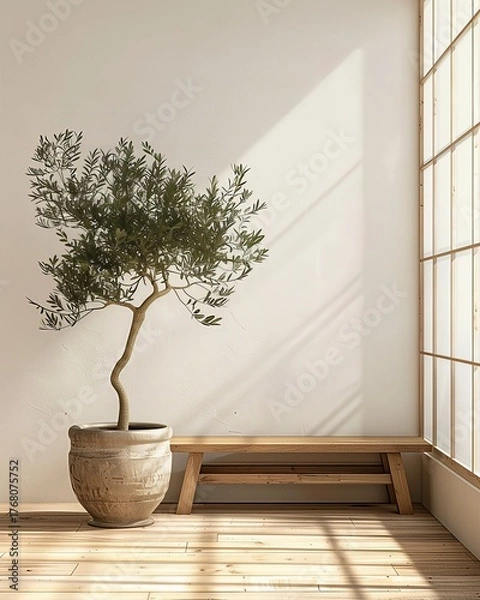 Obraz Minimalist Japandi interior design with a potted olive tree on a wooden floor. Sunlight from a Japanese grid window casts shadows on a beige wall. Serene Zen or Wabi-Sabi aesthetic background with cop