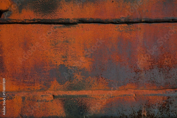 Fototapeta Background, texture, empty space for design. Rough, rough surface. Rusted metal surface closeup. Place for text