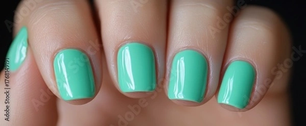Obraz Close-up Macro Shot of Four Perfectly Manicured Nails with Vibrant Teal Polish