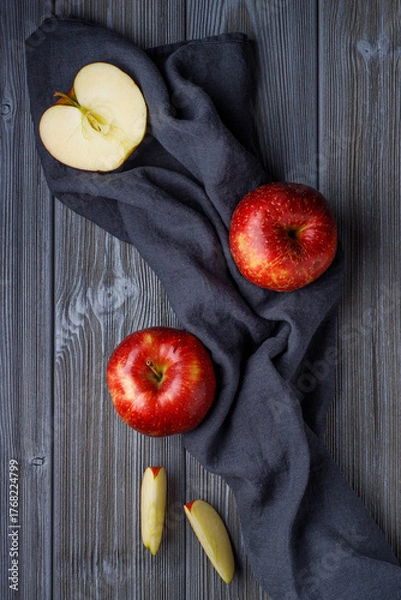 Fototapeta juicy ripe red apples on a dark background