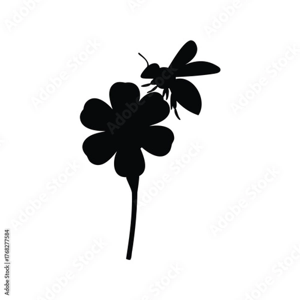 Fototapeta A simple silhouette illustration of a bee perched on a flower blossom