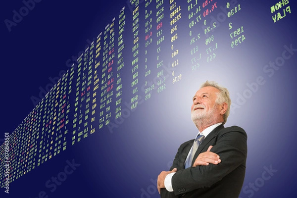 Fototapeta Old Senior Businessman Looking or Watching Stock Market Share Price Data on Virtual Board