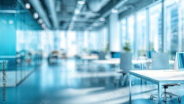 Fototapeta Modern, bright office space with cubicles, desks, and large windows