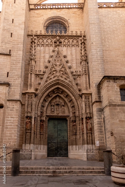 Fototapeta Seville cathedral main entrance door, gothic architecture