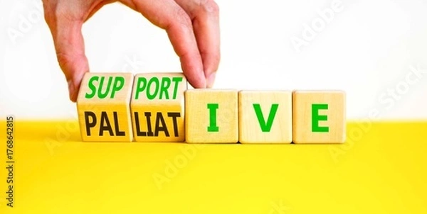 Fototapeta Palliative or supportive therapy symbol. Concept words Palliative to Supportive on beautiful wooden cubes. Beautiful white background. Medical, palliative or supportive therapy concept. Copy space.