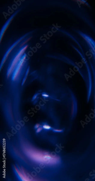 Fototapeta Blur dazzle swirl. Lens flare. Purple blue neon color optical rainbow twirl illuminated texture on abstract creative bokeh art background.