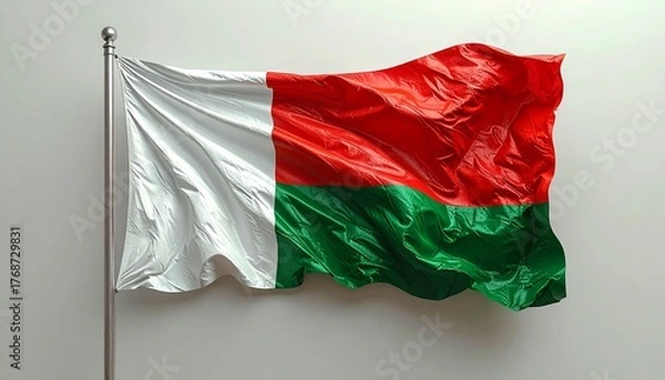 Fototapeta National Flag of Madagascar Waving Against a Cloudy Sky