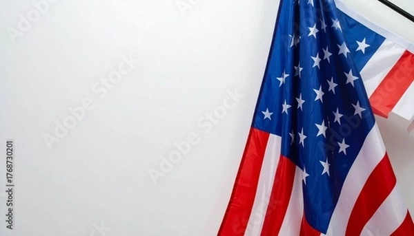 Fototapeta Vertical United States Flag Hanging on Wall with Gold Rod and Soft Shadow