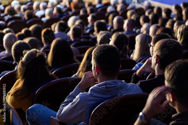 Fototapeta People in the auditorium during the performance. A theatrical production.