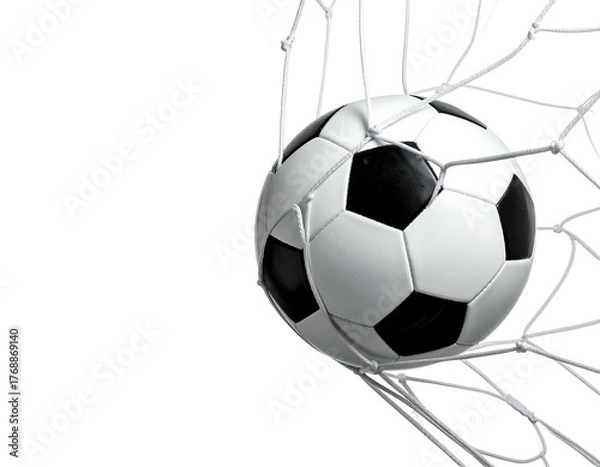 Fototapeta Soccer ball captured in a net, a dynamic shot against a black background