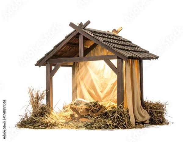 Fototapeta A rustic manger with straw and cloth is lit from within against a dark backdrop, evoking a serene scene