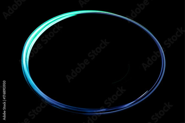 Obraz 黒バックに光る青と緑の光のリング