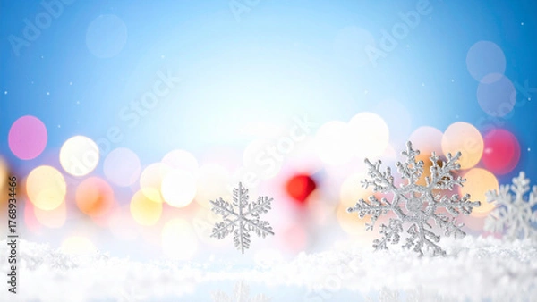 Fototapeta Christmas background with bokeh lights and snowflakes.