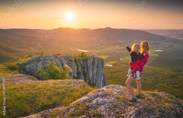 Obraz Mother with child and sunset