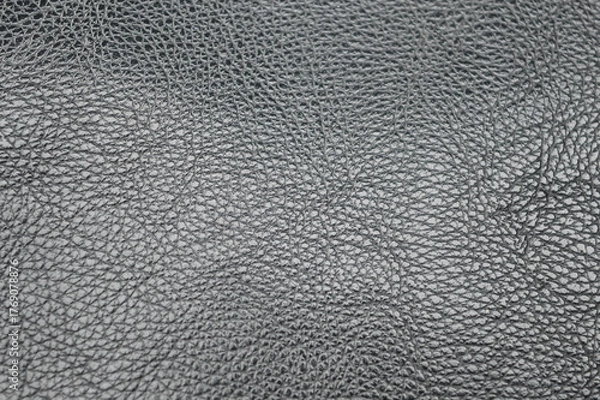 Obraz close-up macro texture of dark gray or black faux leather, vinyl surface. Represents rough material background, upholstery, fashion, abstract texture, and modern design concept.