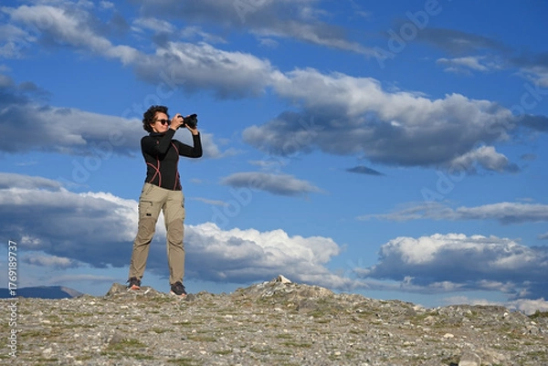 Fototapeta Female tourist in the mountains