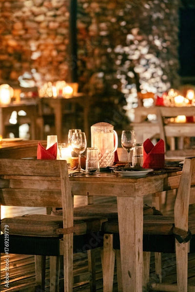 Obraz rustic table with ambient lights and crockery