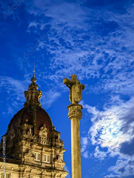 Fototapeta Stone cross and historic dome at twilight with clouds
