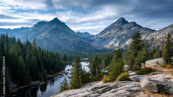 Fototapeta Mountain view above clouds flowers and blooming bushes at sunset sunbeams. Calm close-up beautiful landscape, screensaver background, Beautiful panorama. Summer vacation, holiday, amazing nature.