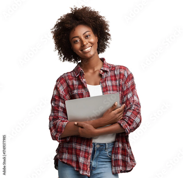 Fototapeta a beautiful, smiling black female student wearing a flannel shirt and jeans, holding a laptop, on a transparent