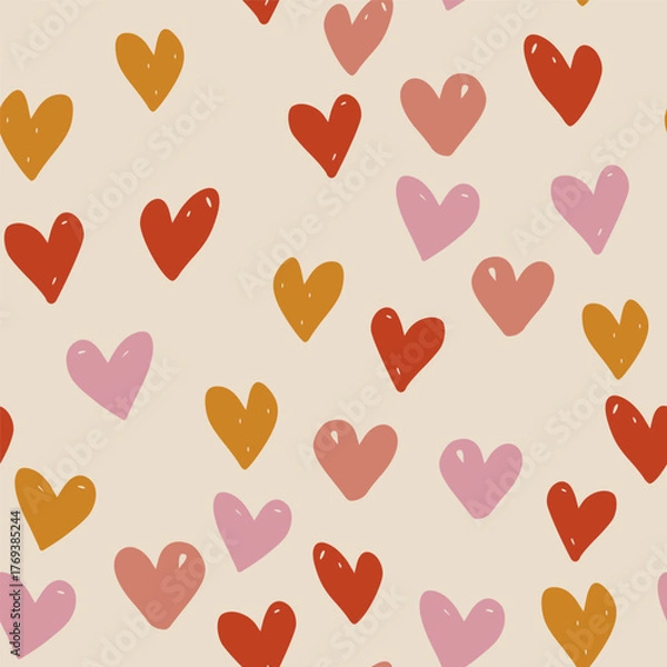 Fototapeta Vector abstract seamless pattern with red, yellow and pink hearts on beige. Hand painted love illustration for design, print, fabric or background.