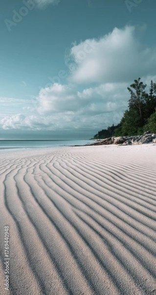 Fototapeta Tranquil Beach Scene with Rippled Sand.