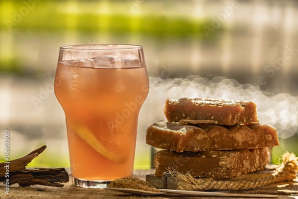 Fototapeta Traditional Colombian drink made from panela and lemon Colombian culture