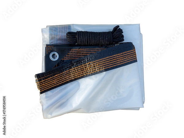 Obraz Transparent, waterproof tarpaulin with metal holes for tightening rope. Rainproof polyethylene fabric for covering garden furniture, patio or greenhouse. Multifunctional durable waterproof film