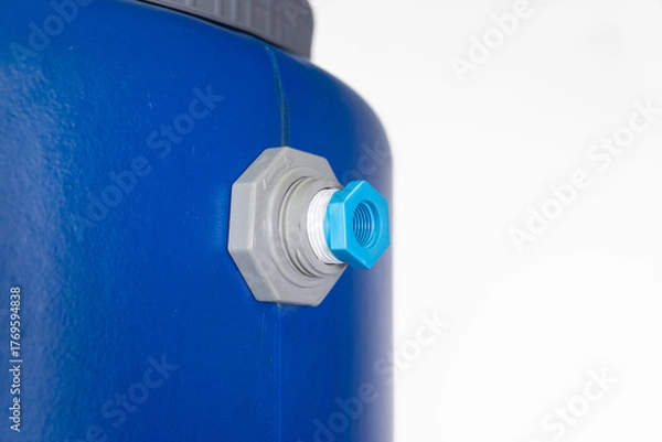 Obraz Plumber's Hand Wrapping White PTFE Thread Seal Tape Around a Bushing Reducer Coupling Pipe Fitting for Inlet