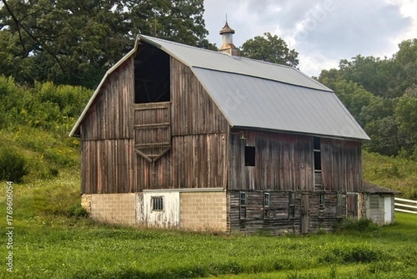 Obraz Summer landscape featuring an old barn along a recreational trail in Southeastern Minnesota.