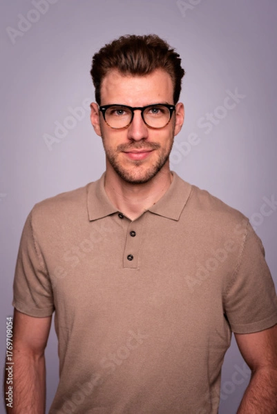 Obraz Studio shot of a handsome young man standing against isolated background with copy space
