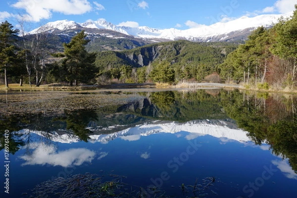 Obraz mountain landscape with small lake and mirror reflection of the peaks in southern alps, france