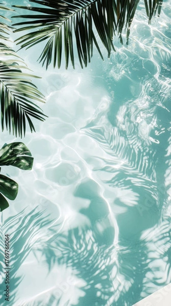 Fototapeta Tropical pool water reflections with palm leaves and sunlight