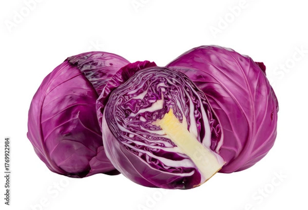 Fototapeta red cabbage, half and whole heads on white background.