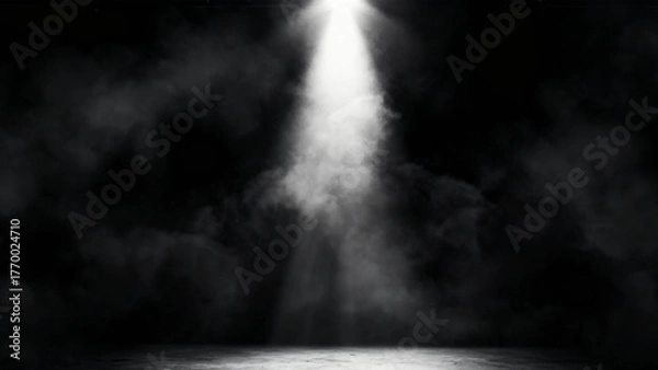 Fototapeta Dramatic bright white spotlight beam illuminating smoky darkness from above creating an ethereal atmosphere