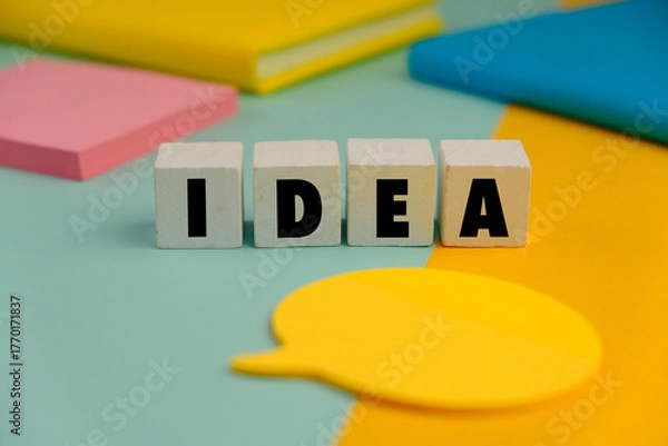 Fototapeta White block with the word idea. concept idea. concept of thinking. Creativity, New idea, analytical thinking, inspiration concept, vision concept.