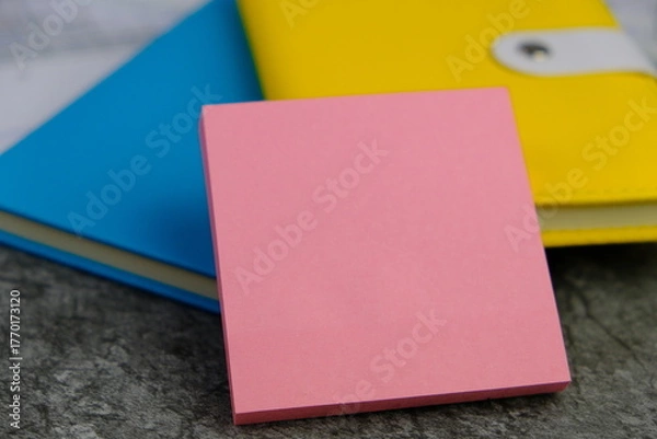 Fototapeta blank paper next to school tools with no word as a template for text space concept. business and education concept