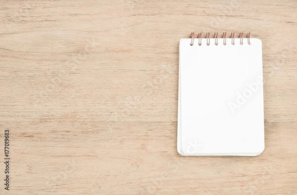 Obraz opened notebook on wood texture