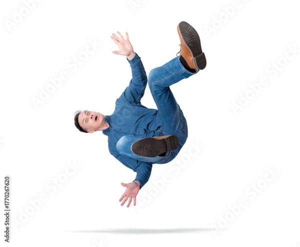 Obraz Shocked man in jeans and shirt falling in mid air with arms wide open, transparent background PNG, concept of failure, danger, accident, or unexpected situation.