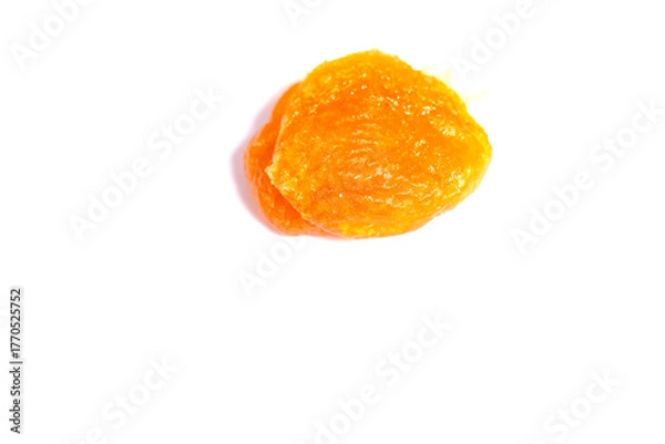 Fototapeta Dried apricot fruits isolated over white background