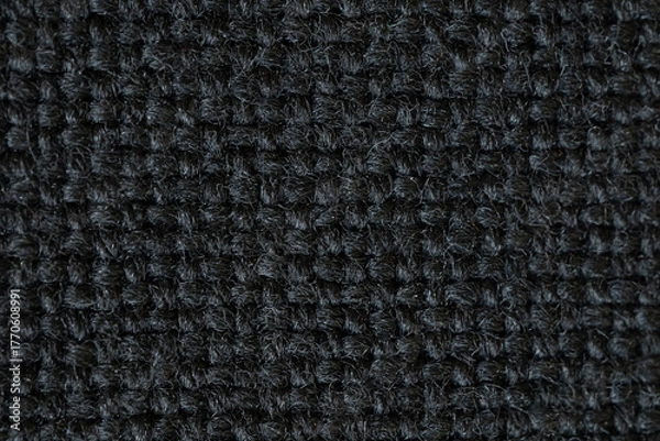 Fototapeta A macro close-up showcasing the rich, intricate textures of textile, tapestry, and leather materials