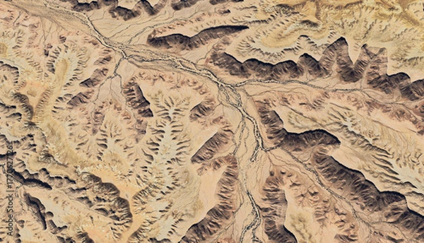Obraz Aerial view of a dried-up riverbed in the desert of Saudi Arabia August 2025