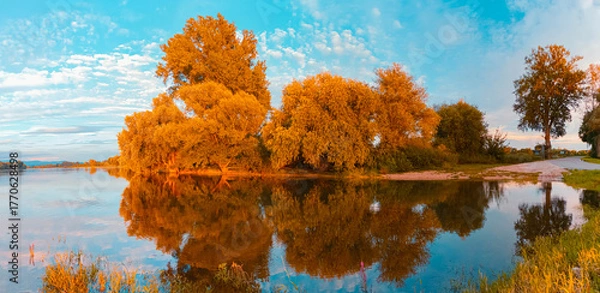 Fototapeta Beautiful summer evening view with reflections at Stephansposching, Danube, Deggendorf, Bavaria, Germany