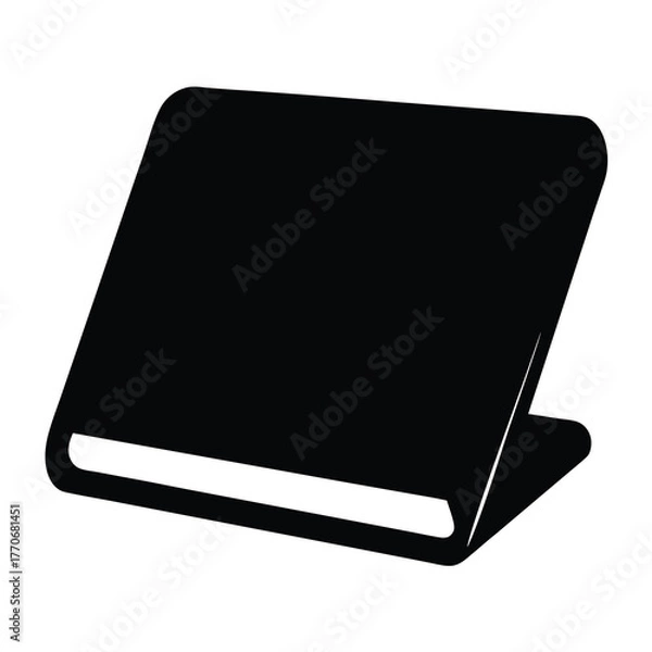 Fototapeta Black silhouette of a book, standing open on a surface in perspective