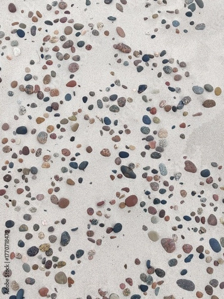 Obraz Colorful Pebbles and Stones on Light Sand – Natural Beach Texture Background