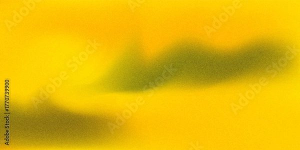 Fototapeta Warm yellow and orange gradient abstract composition background. It has a fine grainy texture (like digital noise or fine grains of sand) and appears blurry or foggy.